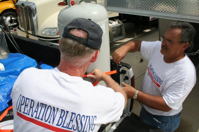 OBI disaster response teams prepare a convoy to head into the areas affected by Hurricane Ike.