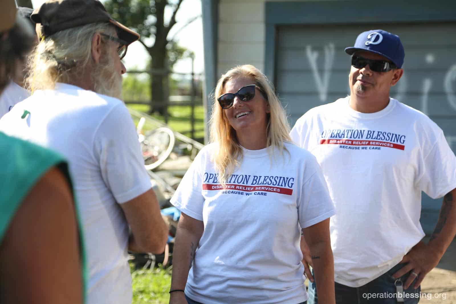 Amy talks with a disaster victim named Mike.