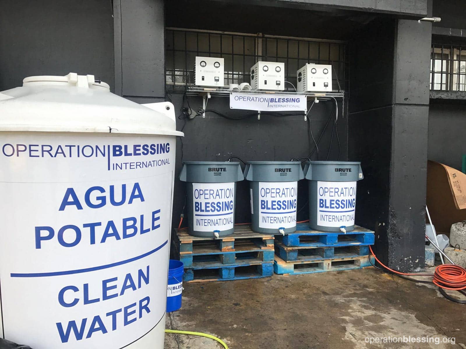 Containers full of safe water thanks to OBI safe water solutions.