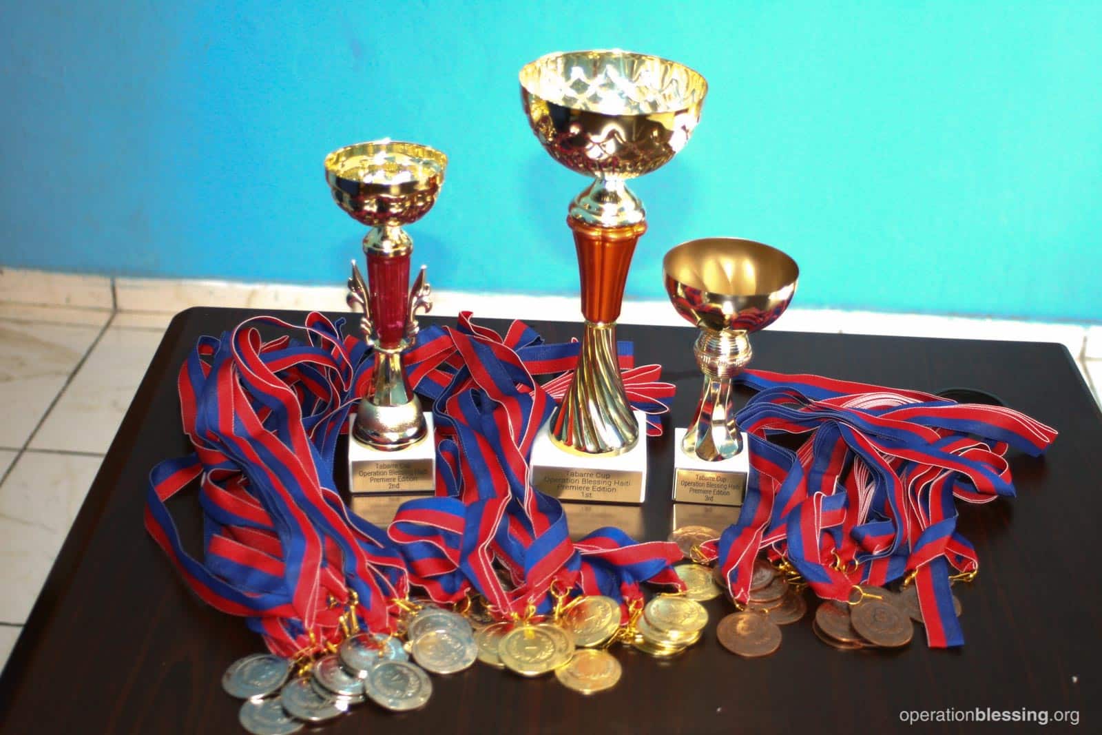 Baseball tournament trophies and medals.