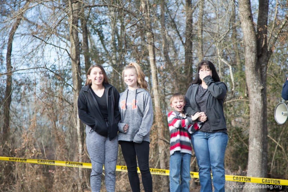 Gabe and his family see their restored home for the first time.