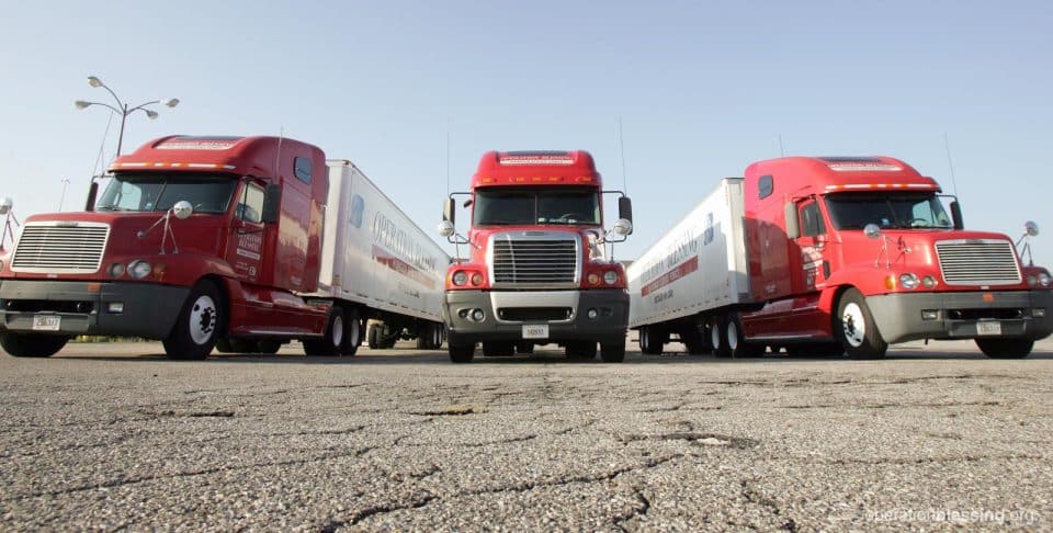 Semi-trucks from OBI's Hunger Strike Force deliver food and supplies in the U.S.