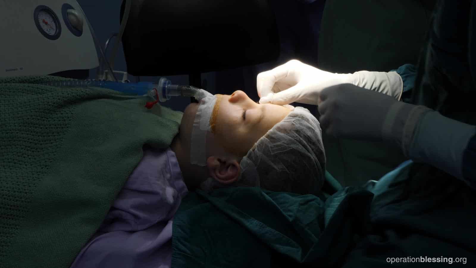 A young boy receives life-changing surgery on his eyes.