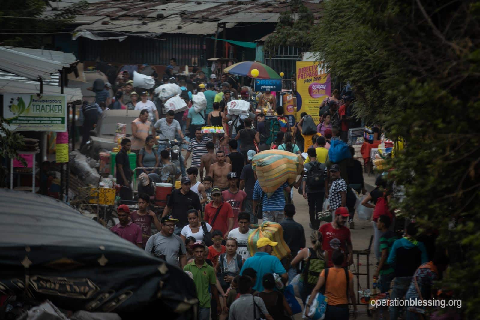 Huge mobs of refugees fleeing the crisis in Venezuela.