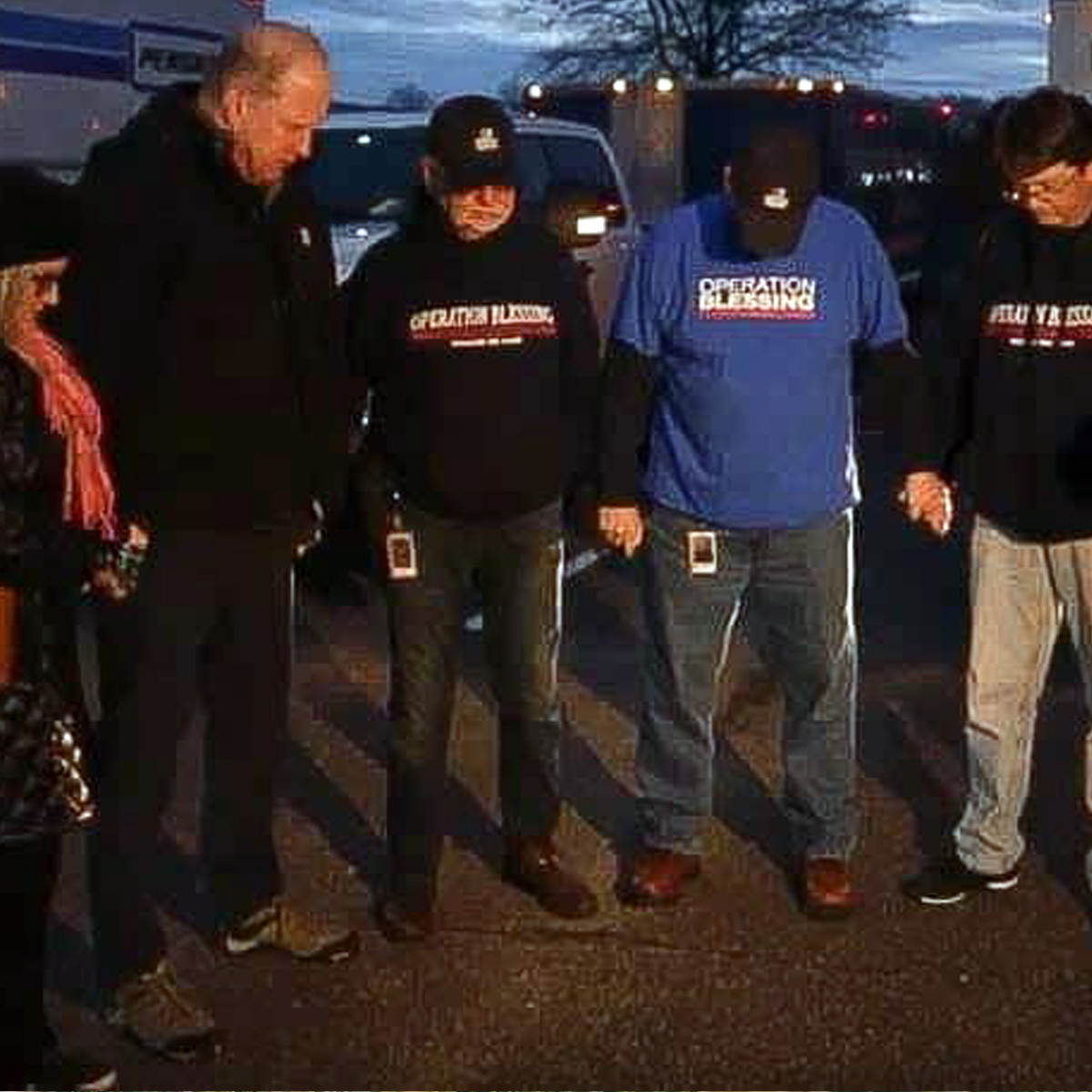 The team prays as Operation Blessing sends relief to the Dayton tornado victims.