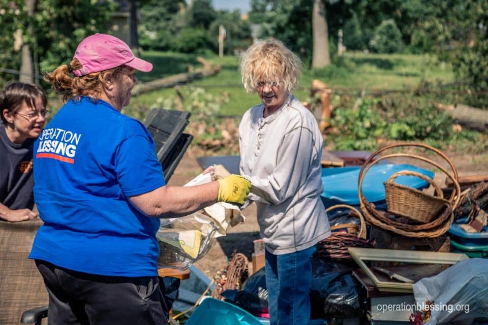 One of Anita's angels helping her sort through the debris.