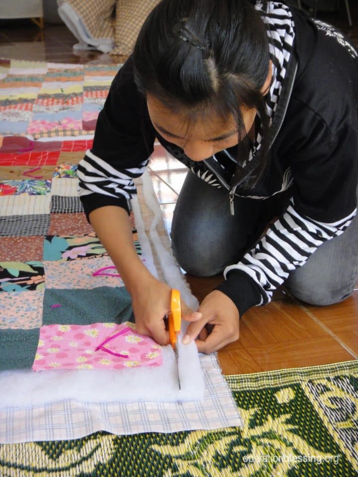 Human trafficking victim given new life and learning to sew