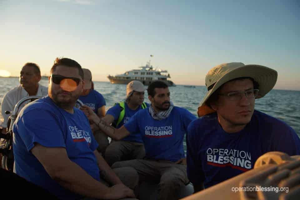 Operation Blessing disaster relief staff travel by small boats to the Abaco Islands after Hurricane Dorian.