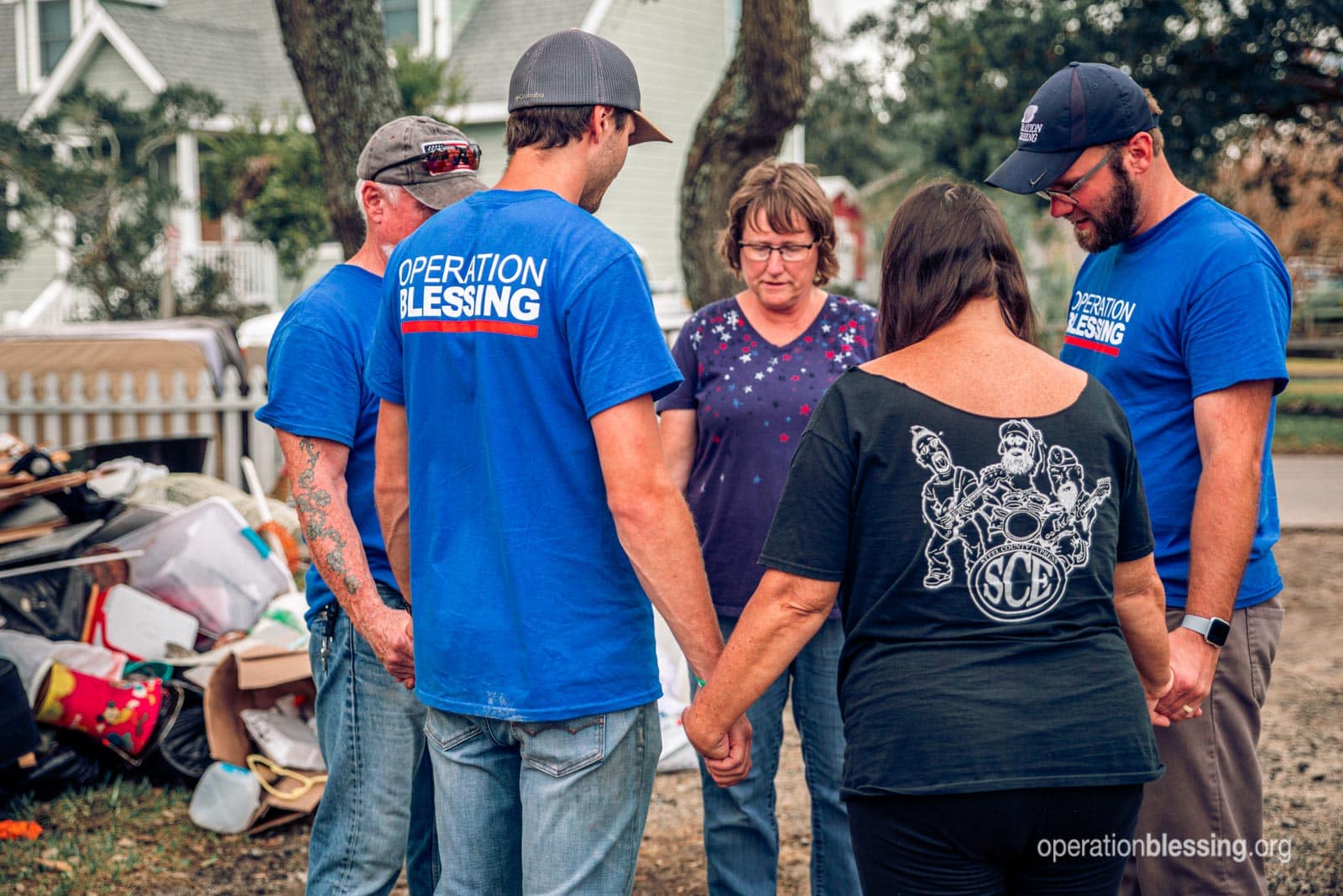 Operation Blessing is serving and praying with hurricane victims.