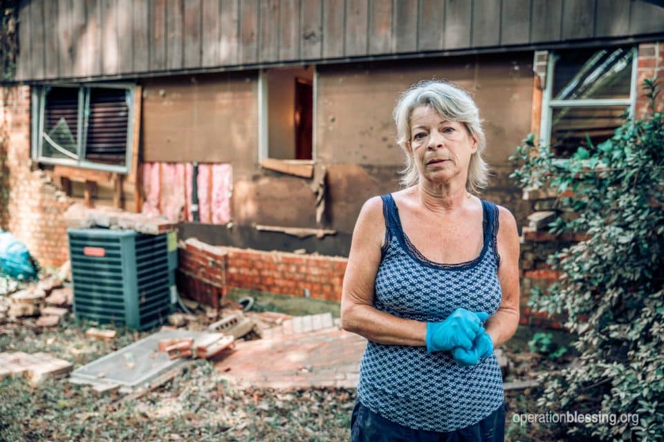 Returning to Texas to help flood victims like this woman.