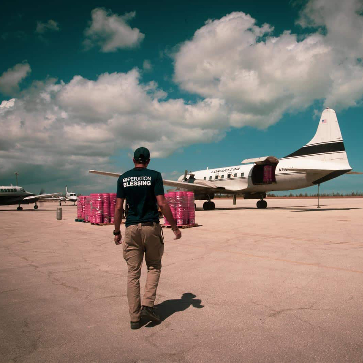 Judah 1 aviation ministry plane, Home Depot disaster relief buckets, and Operation Blessing worker.