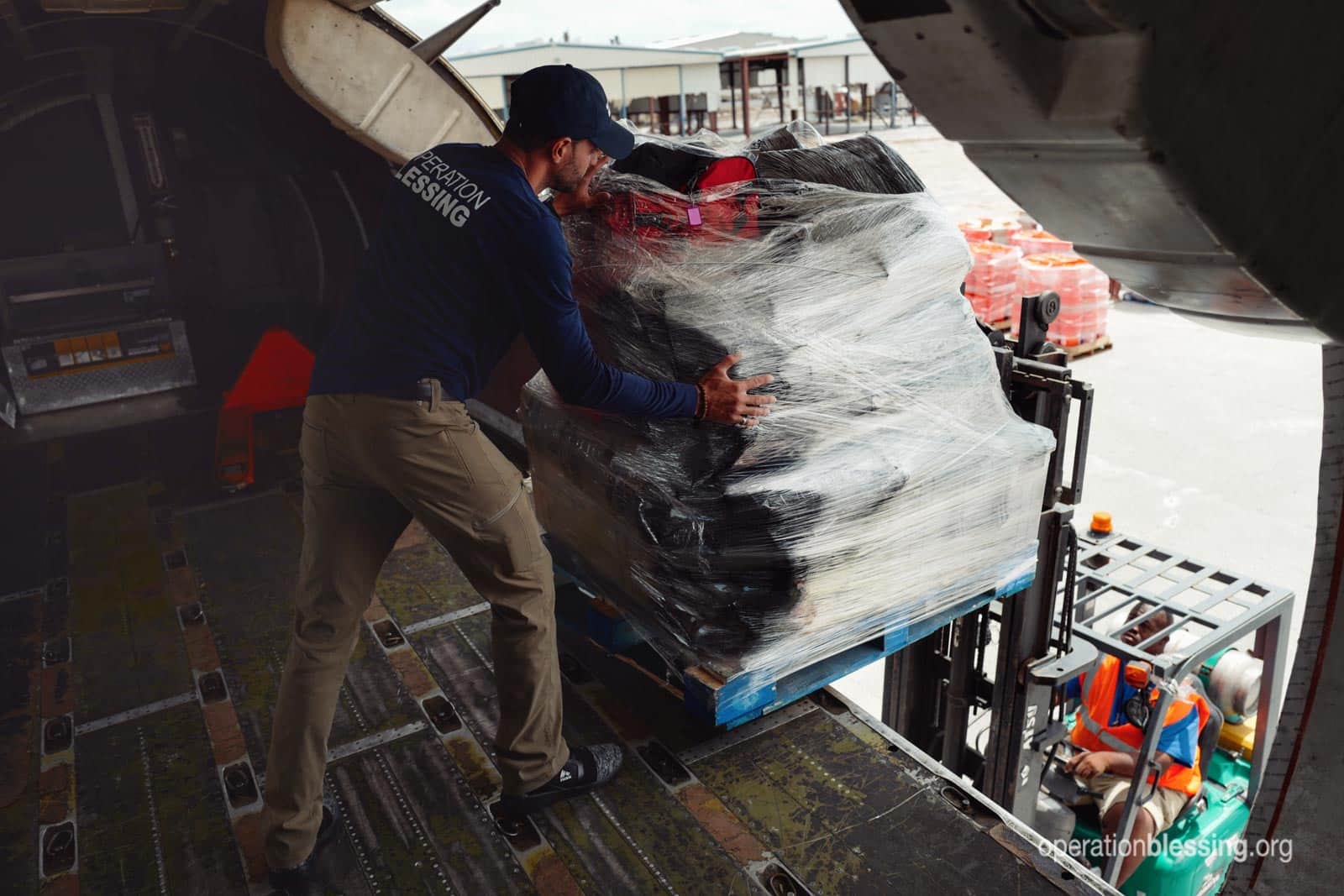 Plane unloading humanitarian supplies in the Bahamas.