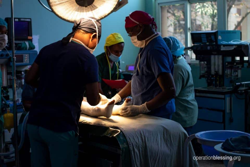 Doctors operating in a life-changing surgery.