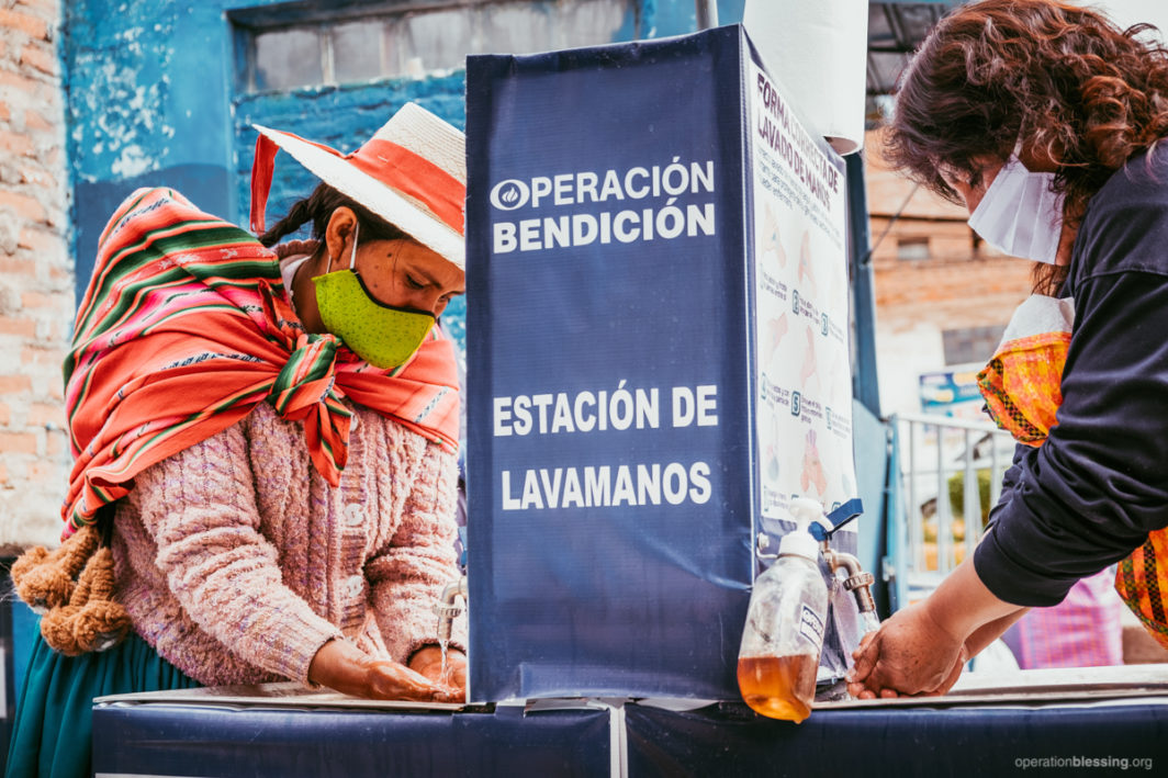 Hand washing stations help fight COVID-19 in Peru.