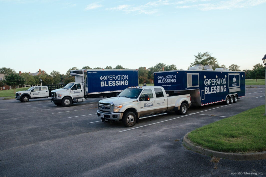 Convoy of Operation Blessing disaster relief vehicles heading toward Gulf Coast.