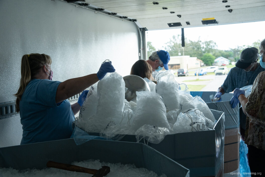 Distributing ice and supplies to victims of Hurricane Sally in Florida.