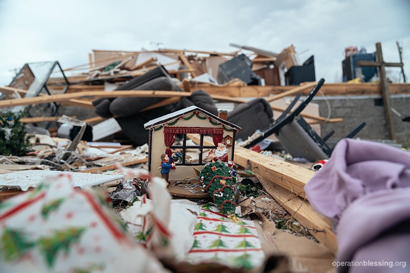 Sad photo of Christmas decoration in tornado ruins