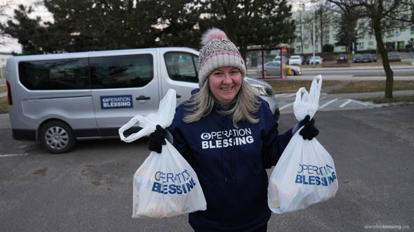 Handing out disaster relief supplies for Ukraine