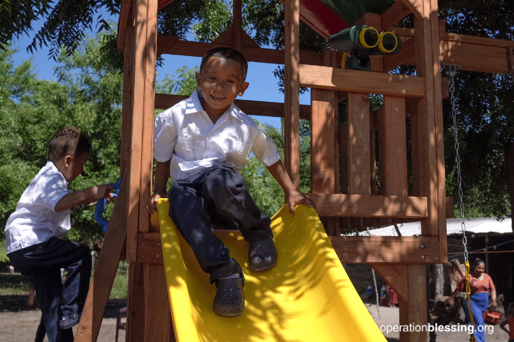 children at school playground in honduras