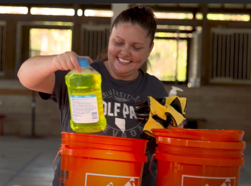 volunteer, recipient receives hurricane ian recovery supplies