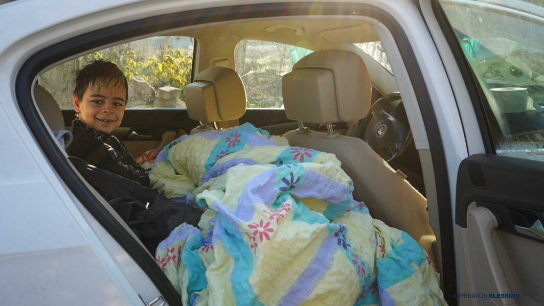 Families sleeping in cars in Turkey